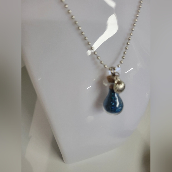 TEAL HOLOGRAPHIC glitter pixie fairy dust necklace with small shell charm. - Picture 2 of 6
